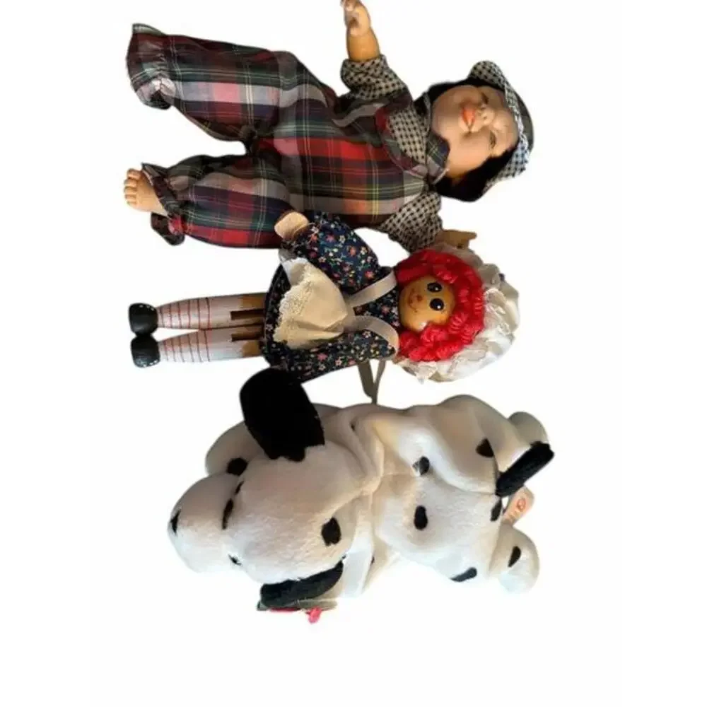 Dolls are around 7” and a beenie baby